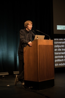 Picture of Kristoffer Gansing announcing the Keynote Conversation "Anxious to Act"