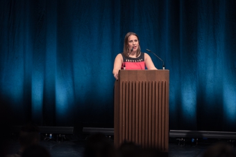 Picture of Theresa Züger introducing the Keynote Conversastion "Anxious to Secure"