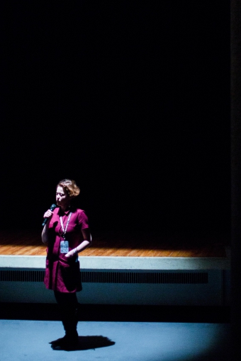 Picture of Teresa Dillon introducing "Fear of Silence, or A Brief History of the Air-Raid Siren"