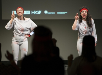 Picture of Phoebe Osborne (left) and Liat Berdugo (right) at the workshop "Unpatentable Multi-touch Aerobics"