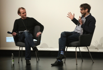 Florian Wüst (left) in conversation with Caspar Stracke (right) after the screening "redux/time/OUT OF JOINT" at transmediale 2017.