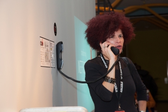 Diana McCarthy operating the "OCTO P7C-1 Intertubular Pneumatic Packet Distribution System", transmediale 2013 BWPWAP.