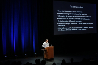 Jonathan Beller delivering his keynote "Derivative Living" at transmediale 2018 face value