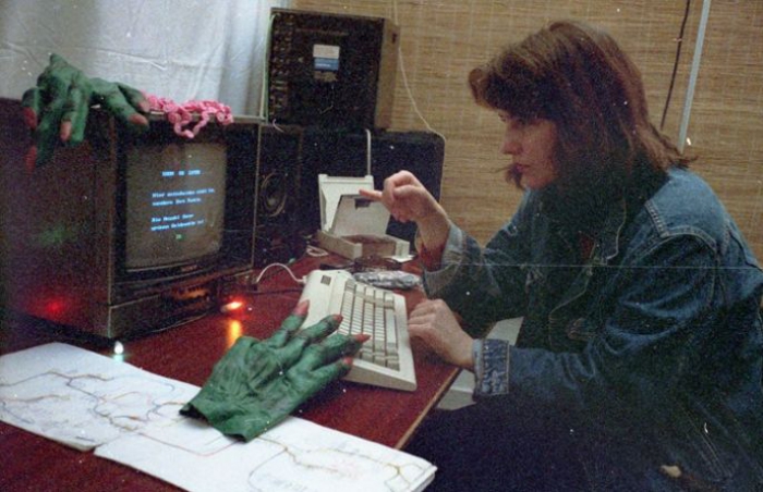 Ásdis Thoroddsen (dffb class of 1983) with a selection screen from Mutabor III/Videolabyrinth, playing during VideoFest 1988 at MedienOperative, Potsdamer Str. 96. Photo: Friederike Anders.