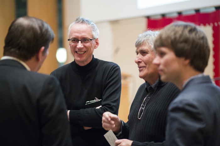 Picture of Andreas Broeckmann (center) in conversation after the 2017 Marshall McLuhan Lecture