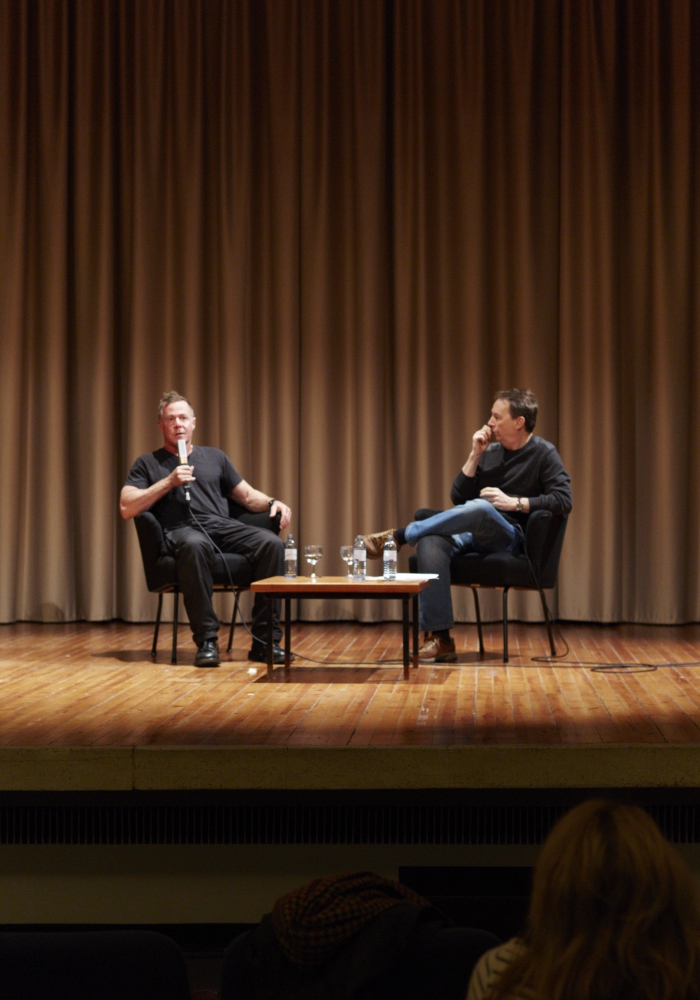 Picture of Jordan Crandall (left) in conversation with Ryan Bishop (right) after the performance "Materialities of the Robotic"