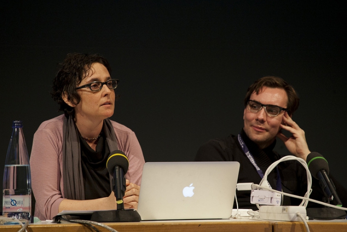 Gabriella Coleman and Jacob Appelbaum (left to right) at "Anonymous Codes: Disruption, Virality and the Lulz", transmediale 2012 in/compatible.