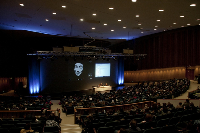 Impression of the panel "Panel Anonymous Codes: Disruption, Virality and the Lulz", transmediale 2012 in/compatible.
