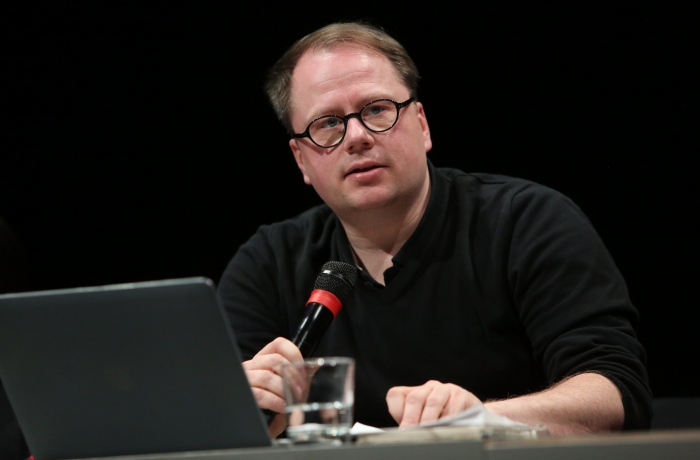 Francis Hunger during the panel "Biased Futures" at transmediale 2018 face value.
